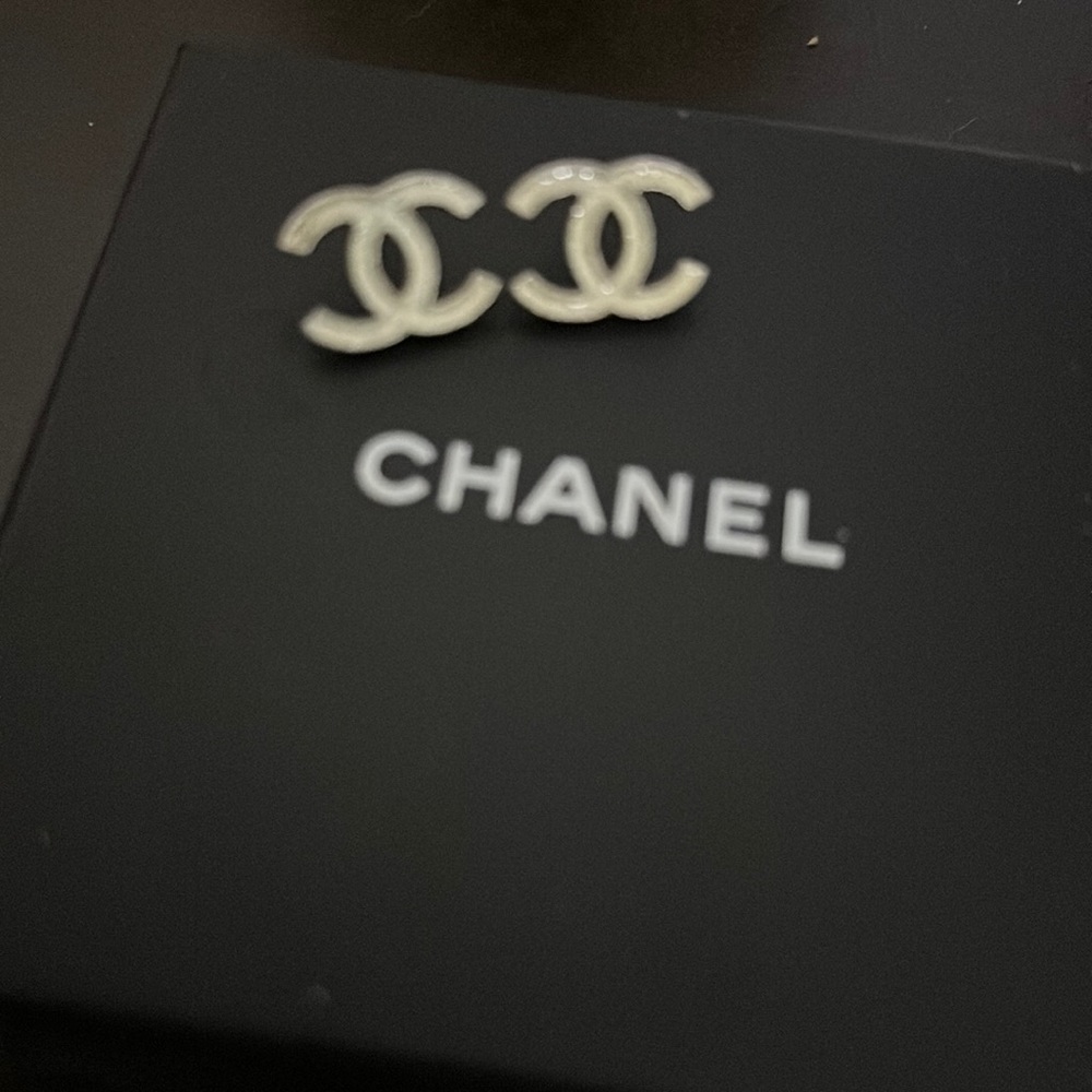 Chanel earrings white color very classic